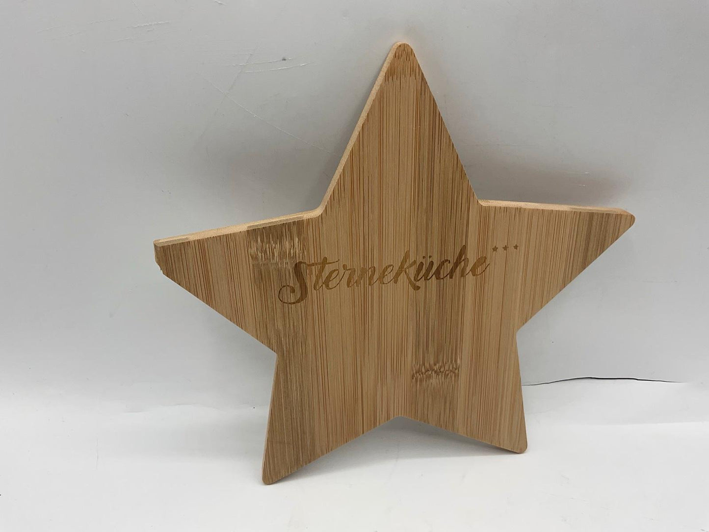 Räder Holzstern Sterneküche